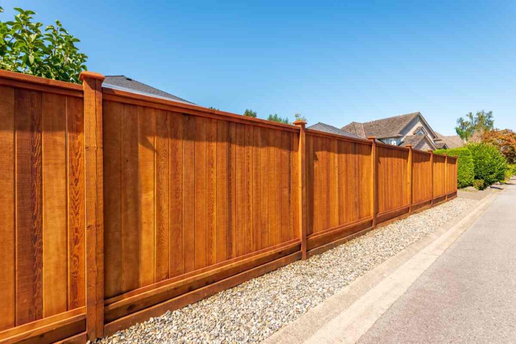 Wood fence in front of a residential yard near Nicholasville, KY.